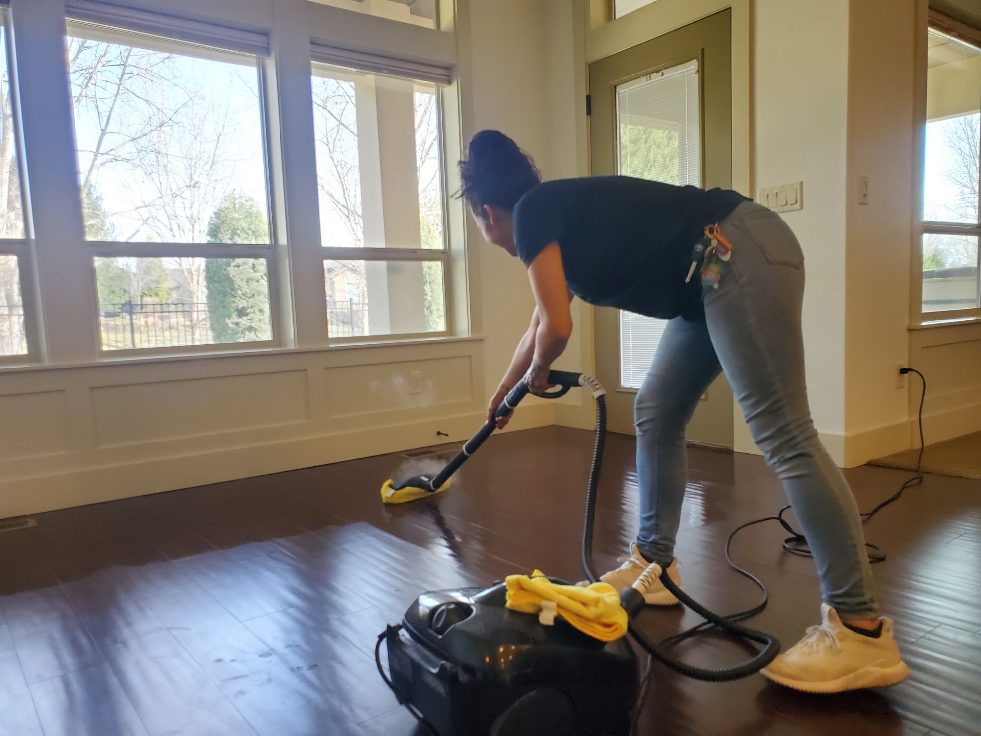 Happy homeowner in clean home